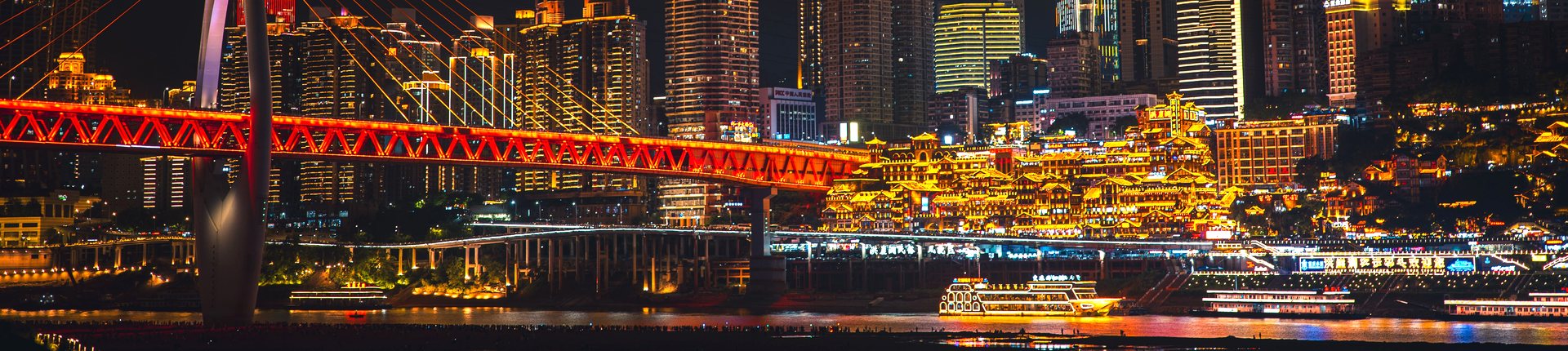 Hongya Cave and Qiansimen Bridge lit up at night, Chongqing