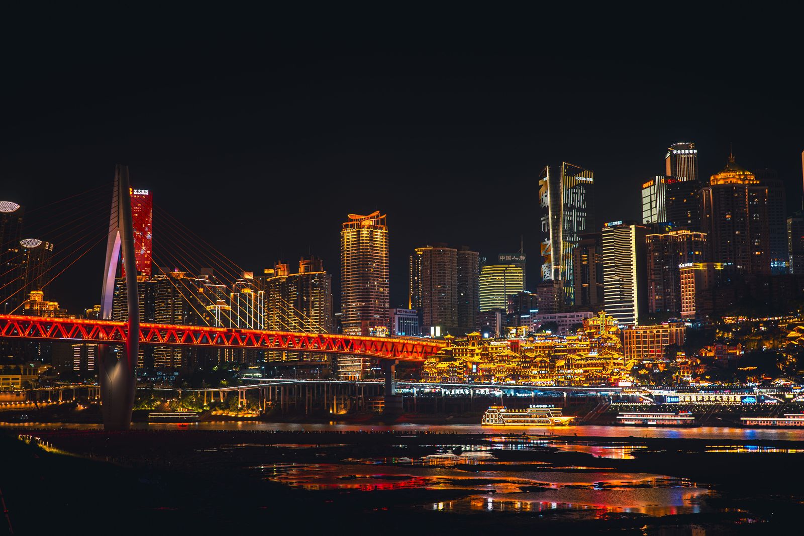 Hongya Cave illuminated at night, Chongqing